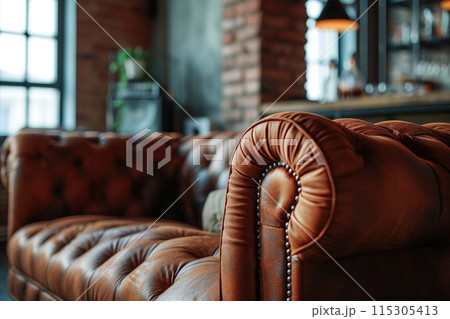 Sleek Sophistication: Neo-Industrial Sofa Close-up Sleek Sophistication: Neo-Industrial Sofa Close-up 115305413