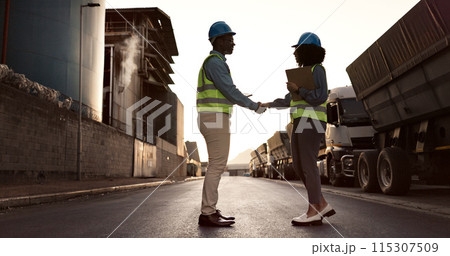 Engineer, handshake and people at construction site for welcome, greeting or agreement on building plan. B2B, contractor man and black woman with clipboard for deal, partnership and collaboration 115307509