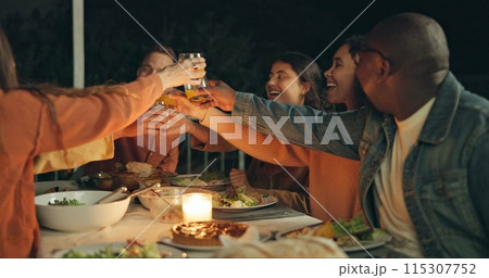 Friends, group toast and dinner on patio, night and conversation with food, new years eve and party. Women, man and outdoor at table with juice, memory or celebration with cheers, diversity or goals 115307752