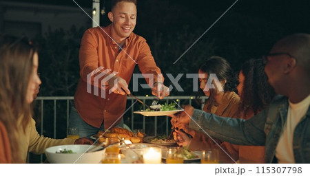 Friends, night and man with knife for chicken on patio, happy or talk for food at new years eve party. Women, group and cutting at table for chat, memory or giving plate for meat, diversity or event Friends, night and man with knife for chicken on patio, happy or talk for food at new years eve party. Women, group and cutting at table for chat, memory or giving plate for meat, diversity or event 115307798
