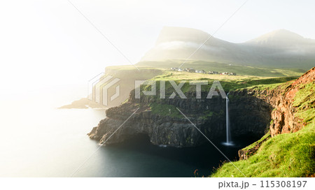 Panorama of foggy Mulafossur waterfall in Gasadalur village 115308197