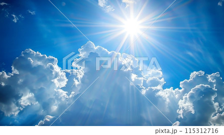 Clouds in the sky with the sun and sunlight sending out beams of light 115312716