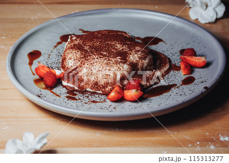 Decadent Delight: Chocolate Drizzled Dessert With Fresh Strawberries 115313277