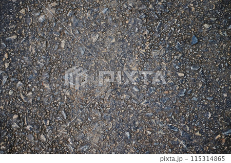 Concrete road have a rough surface. Gravel craggy texture and background 115314865