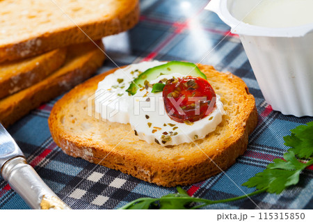 Sandwich with green cheese 115315850