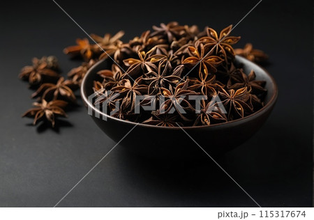Anise on a black background. 115317674