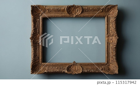 An empty picture frame hangs on the wall. Mock up. 115317942