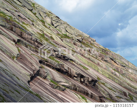 Ancient stone layers, diagonal bottom of the world ocean, faults, rocks. Ancient stone layers, diagonal bottom of the world ocean, faults, rocks. 115318157