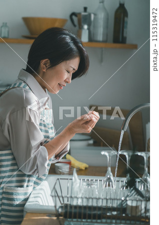 a forty-something woman a forty-something woman 115319472