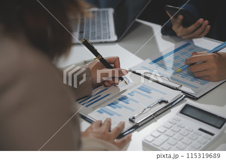 Business team collaboration discussing working analyzing with financial data and marketing growth report graph in team, presentation and brainstorming to strategy planning making profit of company. Business team collaboration discussing working analyzing with financial data and marketing growth report graph in team, presentation and brainstorming to strategy planning making profit of company. 115319689