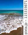 Sea surf on the beach of Spain in spring. High quality photo 115319871