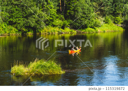 Summer canoeing tourists on the Amota River. High quality photo. Latvia  115319872
