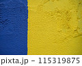 The wall is painted blue and yellow. High quality photo 115319875
