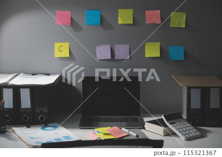 Studio workspace with laptop computer and office supplies. Work from home. With copy space Studio workspace with laptop computer and office supplies. Work from home. With copy space 115321367