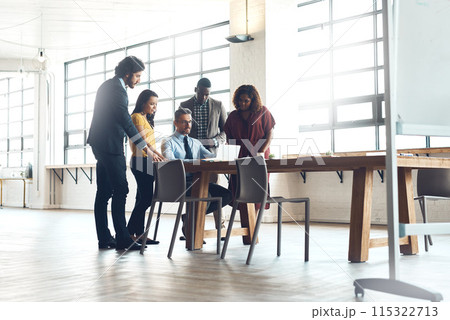 Business people, meeting and conversation with laptop together for performance improvement, mentorship and training. Manager, group and online for learning system or coaching, skills and guidance. 115322713