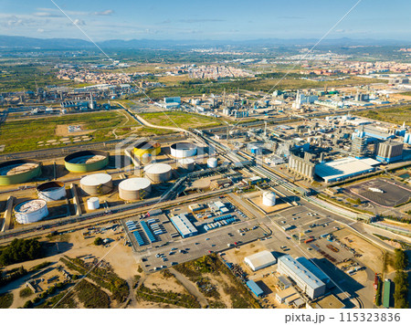 Aerial view of district near Reus city with chemical plant Aerial view of district near Reus city with chemical plant 115323836