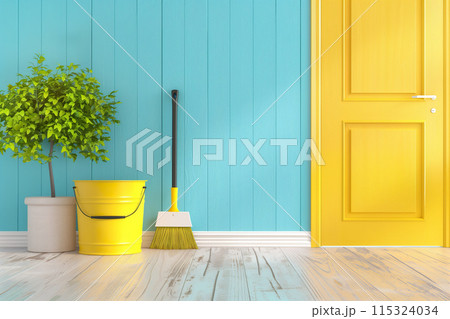 Vibrant yellow broom and bucket with a lush houseplant by a blue wall 115324034