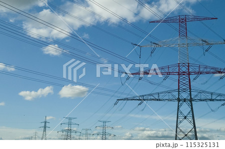 High Voltage Transmission With Pylons And Electricity Wires High Voltage Transmission With Pylons And Electricity Wires 115325131