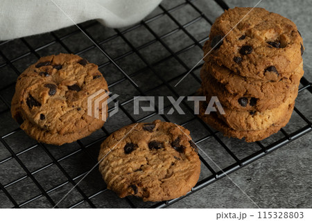 Freshly baked chocolate chip cookies. 115328803