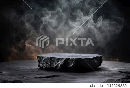 Serene black stones stacked against a mystical smoky background, embodying a tranquil spa concept with a zen-like atmosphere 115329883