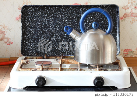 kettle and gas cooker on kitchen kettle and gas cooker on kitchen 115330175
