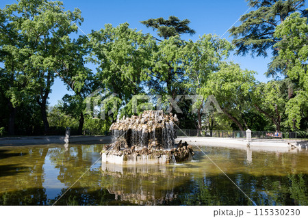 Fountain in Basin of Bells, Estanque de Campanillas, in Retiro Park in Madrid. 115330230