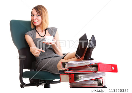 Woman work stoppage businesswoman relaxing legs up plenty of documents isolated Woman work stoppage businesswoman relaxing legs up plenty of documents isolated 115330385