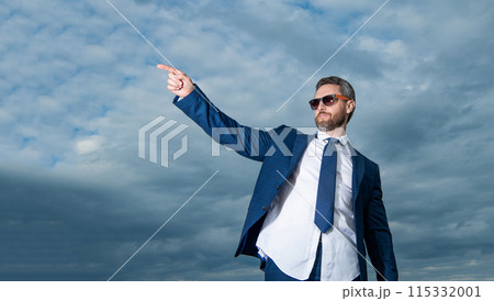 carefree business man in suit outdoor, advertisement. carefree business man in suit. carefree business man in suit outdoor, advertisement. carefree business man in suit. 115332001