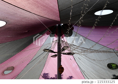 Sun canopy in a city park on the seashore. Sun canopy in a city park on the seashore. 115333125
