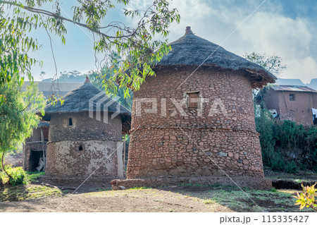 Traditional ethiopian village with thatch roof stone round houses, Lalibela, Amhara Region, Ethiopia. 115335427