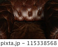 Vintage Brown Leather Chesterfield Sofa Close-up Detail 115338568