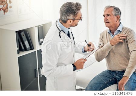 Clipboard, man and doctor in office with shoulder pain, checkup and health advice at senior clinic. Diagnosis, elderly patient and medical professional with support, muscle injury and consultation 115341479