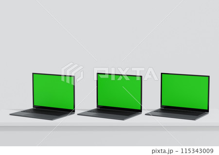 Three laptop open to show green screen display on white background, application website present, 3D Three laptop open to show green screen display on white background, application website present, 3D 115343009