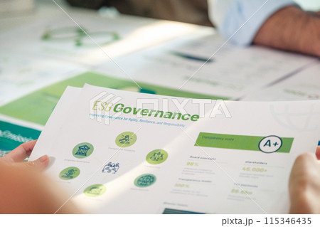 close up diversity team brainstorming focused on ESG (environment,social,governance) for sdgs goals in a sustainable green office close up diversity team brainstorming focused on ESG (environment,social,governance) for sdgs goals in a sustainable green office 115346435