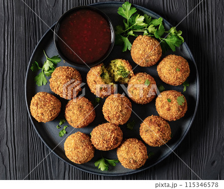fried broccoli cheese balls with sweet chili sauce fried broccoli cheese balls with sweet chili sauce 115346578