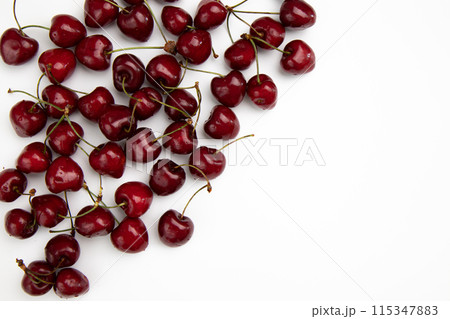 pile of cherries isolated on white background, top view pile of cherries isolated on white background, top view 115347883