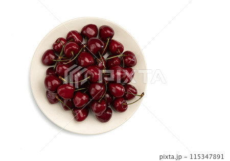 red sweet cherries on plate isolated on white red sweet cherries on plate isolated on white 115347891
