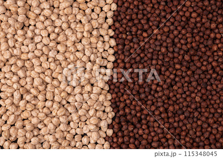 dark and white chickpeas as background texture, top view 115348045