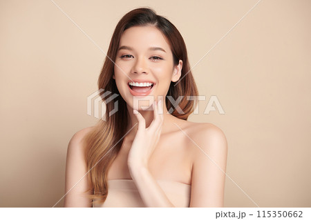 Beautiful smile of young woman with healthy white teeth on beige background, Dental care. Dentistry concept. Beautiful smile of young woman with healthy white teeth on beige background, Dental care. Dentistry concept. 115350662