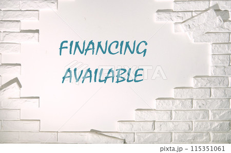 Business concept. Words Financing Available inscription on the wall is lined with bricks Business concept. Words Financing Available inscription on the wall is lined with bricks 115351061
