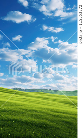 Natural background scene of green hills, blue sky, fluffy clouds, copy space 115353572