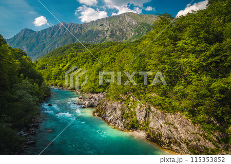 Soca river and high mountains in background, Kobarid, Slovenia Soca river and high mountains in background, Kobarid, Slovenia 115353852