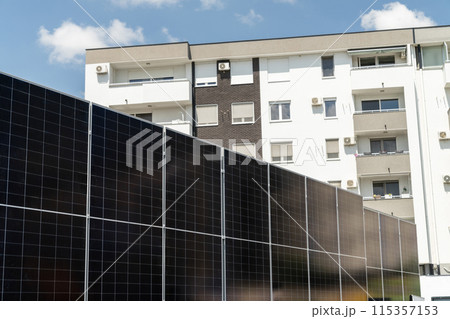 Solar panels near an apartment building Solar panels near an apartment building 115357153