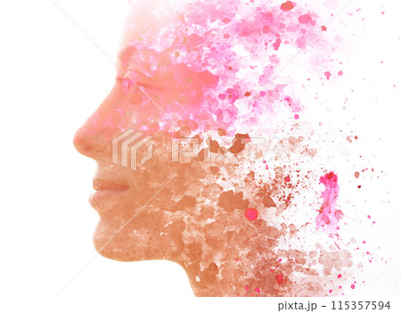 An artistic paint splash paintography profile portrait of a woman 115357594
