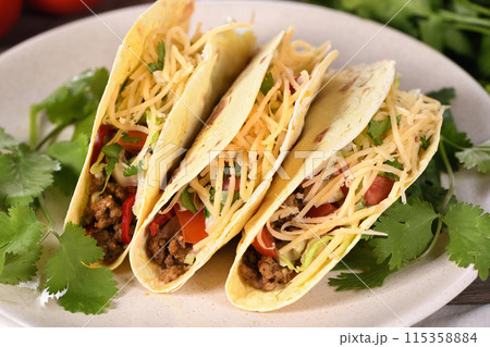 Taco with ground beef, cabbage and cheese 115358884