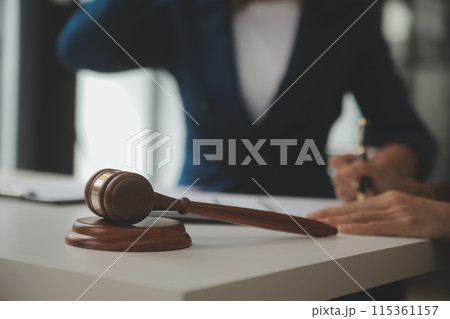Lawyer, legal advisor, businessman brainstorming information on agreement details Business contracts in legal processing books for accuracy in contract documents. joint financial investment. Lawyer, legal advisor, businessman brainstorming information on agreement details Business contracts in legal processing books for accuracy in contract documents. joint financial investment. 115361157