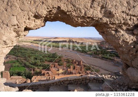 View of Ouarzazate from the Kasbah of Ait Ben Haddou. River dry season. 115361228