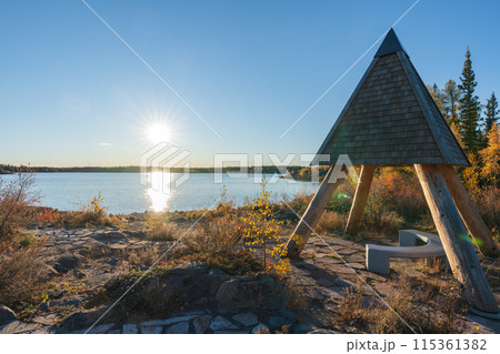 Frame Lake shore at sunset time, clear sky and sunlight. Yellowknife, Canada. 115361382