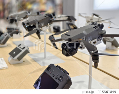 Modern drone for video and photo in the light store 115361849