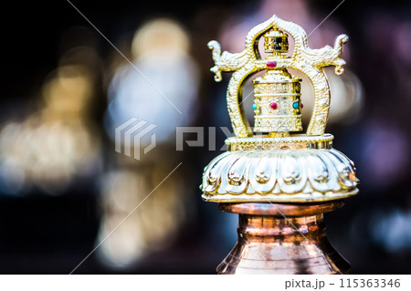 Nepalese prayer wheel at the street market Nepalese prayer wheel at the street market 115363346